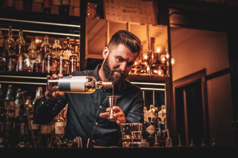 barkeeper mixing cocktail