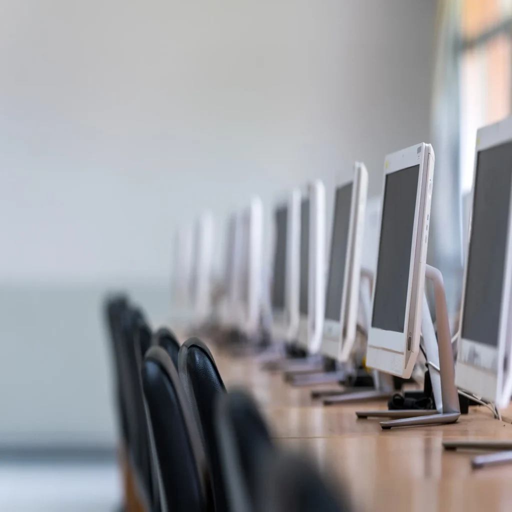 row of computers in room