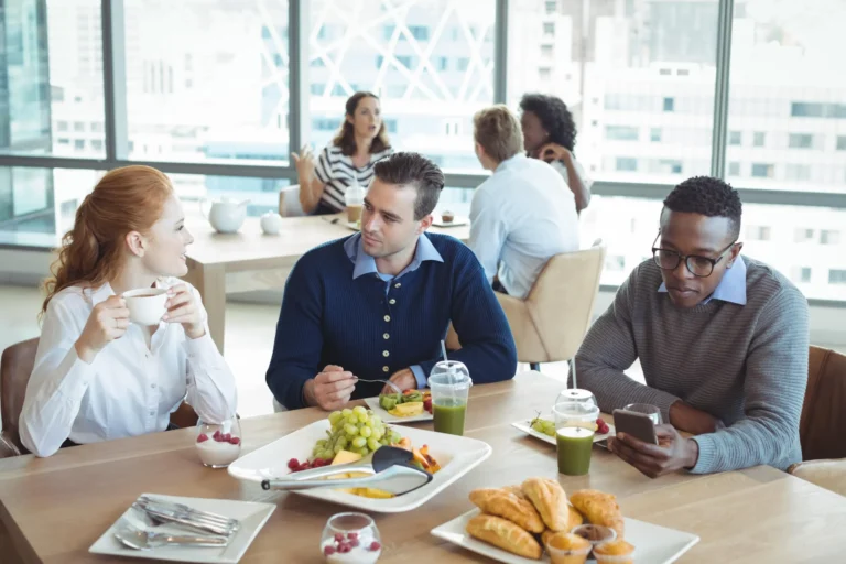 business people having lunch in cafeteria